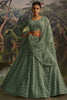 Outstanding Green Thread Work Net Wedding Lehenga Choli With Dupatta