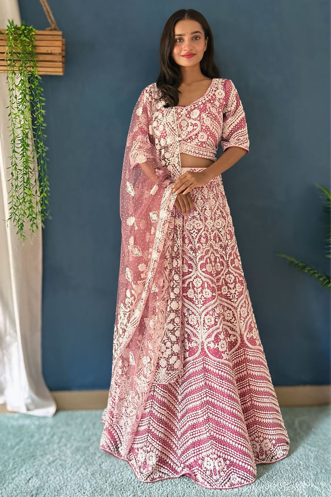 Glamorous Pink Embroidered Net Wedding Wear Lehenga Choli With Dupatta
