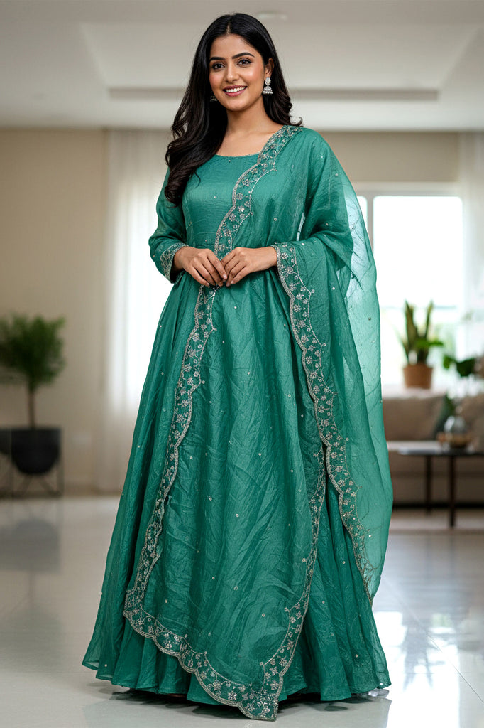 Spectacular Teal Green Sequins Embroidered Silk Gown With Dupatta