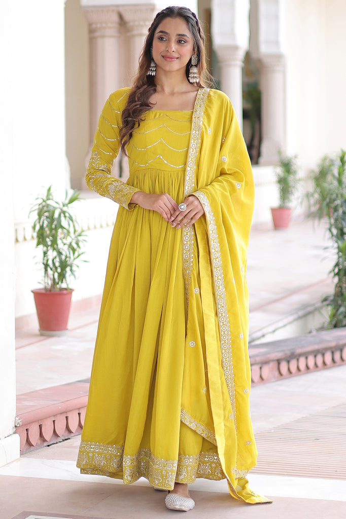 Mesmerizing Yellow Sequins Embroidered Silk Event Wear Gown With Dupatta