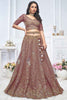 Endearing Purple Embroidered Net Reception Wear Lehenga Choli