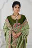 Cherished Pista Green Embroidered Border Dola Silk Wedding Wear Saree
