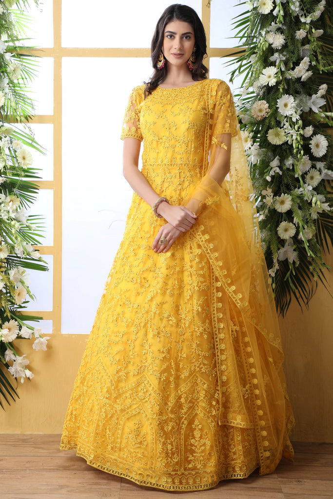 Astonishing Yellow Thread Embroidered Net Haldi Wear Gown