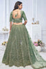 Pretty Green Embroidered Net Bridesmaid Lehenga Choli With Dupatta