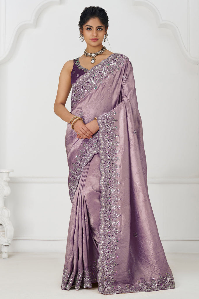 Tantalizing Mauve Heavy Border Work Dola Silk Engagement Wear Saree