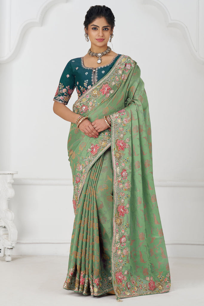Dazzling Pista Green Heavy Border Work Viscose Silk Event Wear Saree