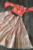 Marvelous Peach Lucknowi Work Net Festival Wear Crop Top Lehenga