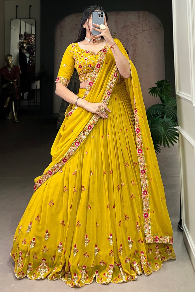 Alluring Yellow Thread Embroidered Georgette Haldi Wear Lehenga Choli