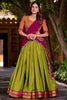 Magnetic Green Kanchipuram Silk Onam Special Half Saree Lehenga