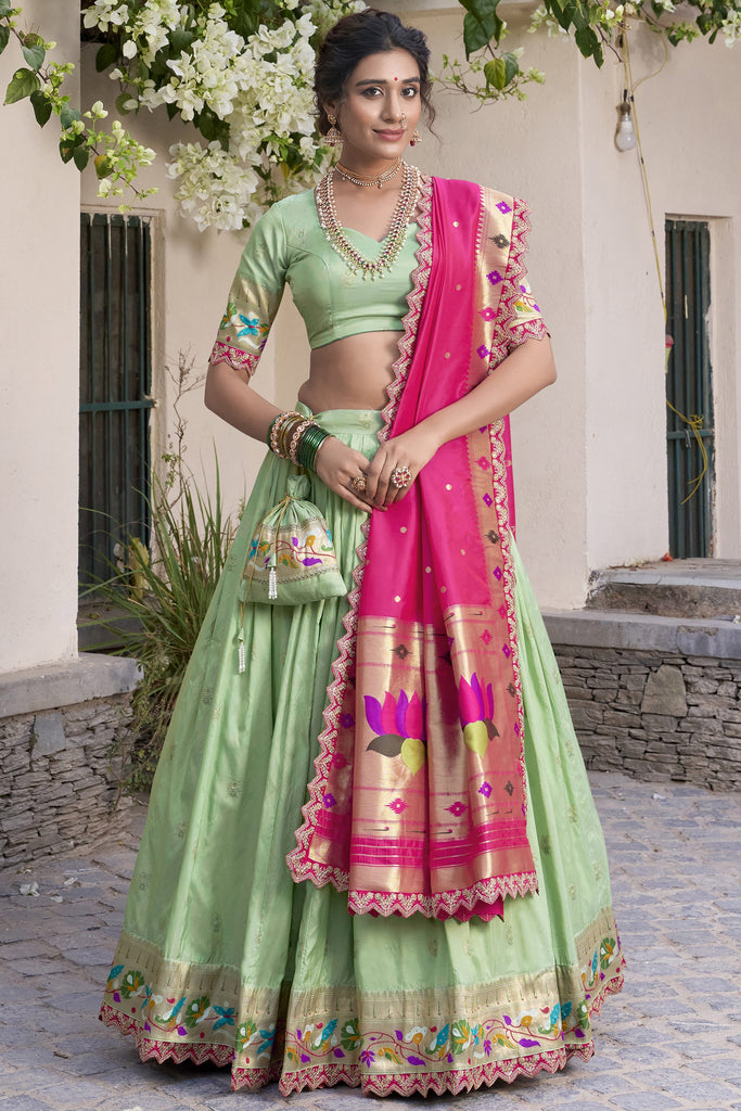Wonderful Pista Green Zari Weaving Silk Festival Wear Lehenga Choli