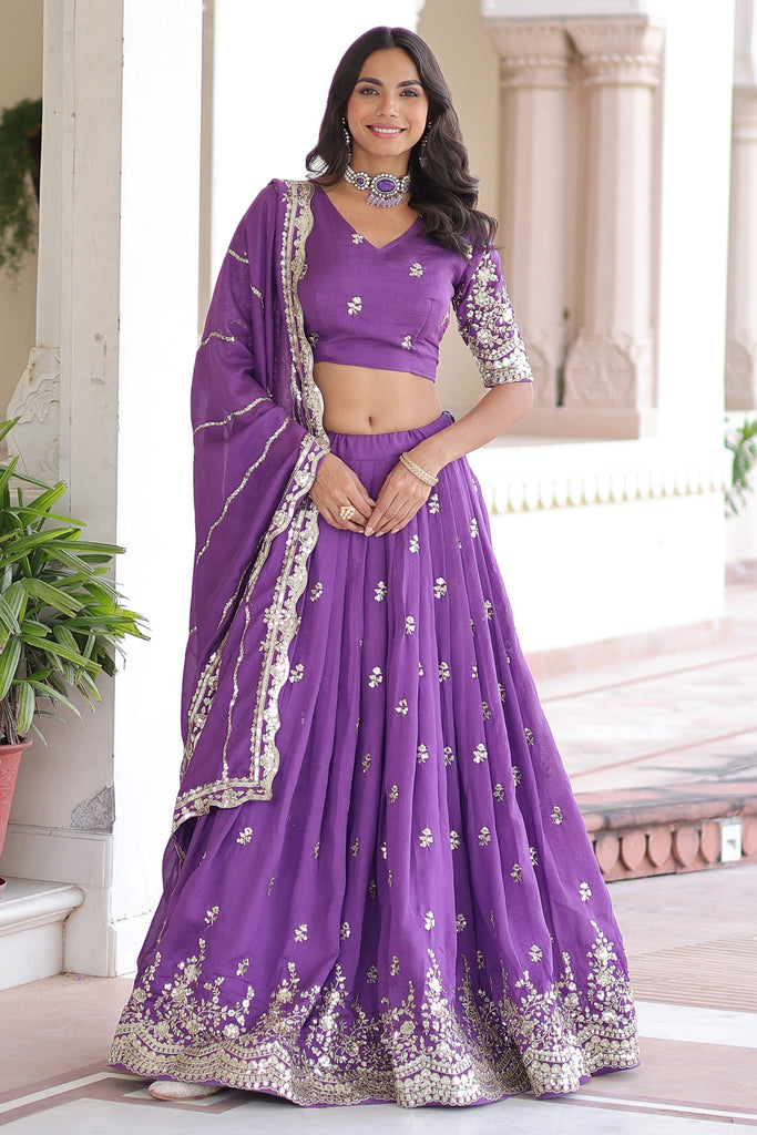 Glamorous Purple Zari Embroidered Silk Wedding Lehenga Choli With Dupatta
