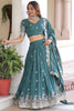 Outstanding Teal Green Zari Embroidered Silk Engagement Wear Lehenga Choli