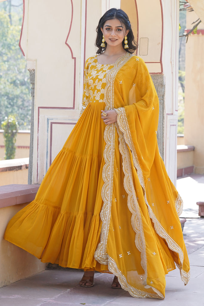 Bewitching Yellow Embroidered Jacquard Haldi Wear Gown With Dupatta 