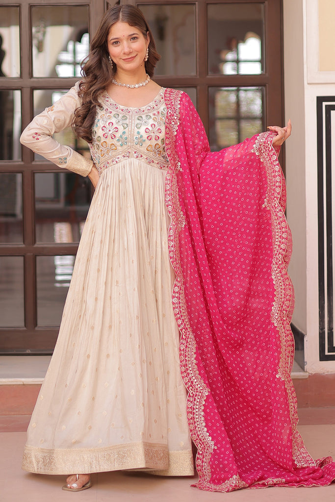 Astonishing Off-White Zari Weaving Silk Event Wear Gown With Dupatta