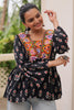 Tantalizing Maroon Patch Work Cotton Navratri Wear Peplum Top