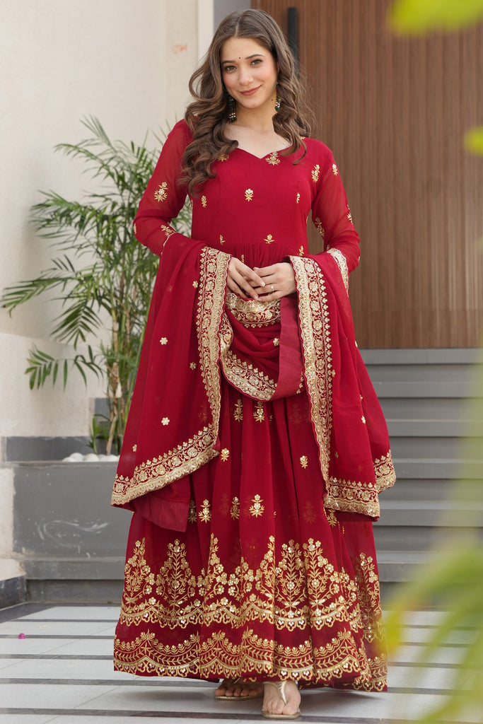 Precious Maroon Zari Work Silk Wedding Wear Gown With Dupatta
