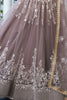 Breathtaking Brown Embroidered Net Wedding Wear Lehenga Choli