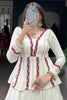 Fascinating White Rayon Navratri Lehenga With Mirror Work Peplum Top