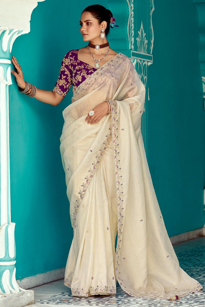Attractive Cream Heavy Border Work Tissue Silk Festival Wear Saree