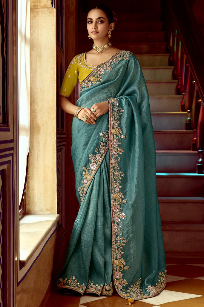 Astonishing Teal Blue Border Work Organza Festival Wear Saree