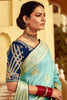 Pretty Sky-Blue Zari Weaving Dola Silk Engagement Wear Saree