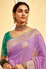 Fascinating Lavender Zari Weaving Dola Silk Wedding Saree With Blouse