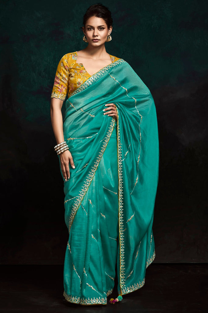 Ravishing Teal Green Embroidered Tissue Silk Festival Wear Saree