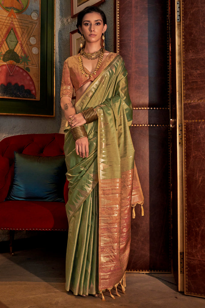 Enchanting Green Zari Weaving Silk Traditional Saree With Blouse