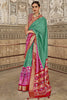 Graceful Teal Green Patola Printed Cotton Festival Wear Saree With Blouse