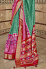 Graceful Teal Green Patola Printed Cotton Festival Wear Saree With Blouse