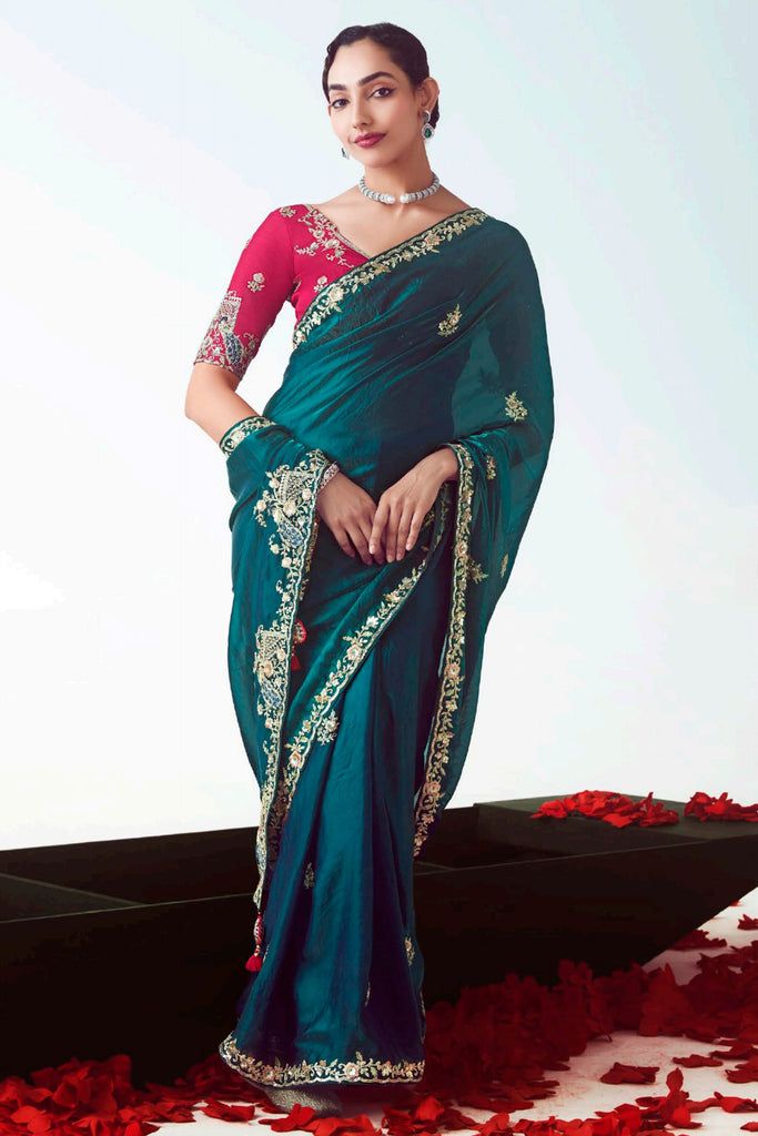 Tantalizing Teal Blue Floral Embroidered Organza Wedding Wear Saree