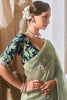 Enchanting Pastel Green Butti Work Reception Wear Saree With Blouse