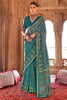 Exquisite Teal Green Patola Printed Georgette Casual Wear Saree