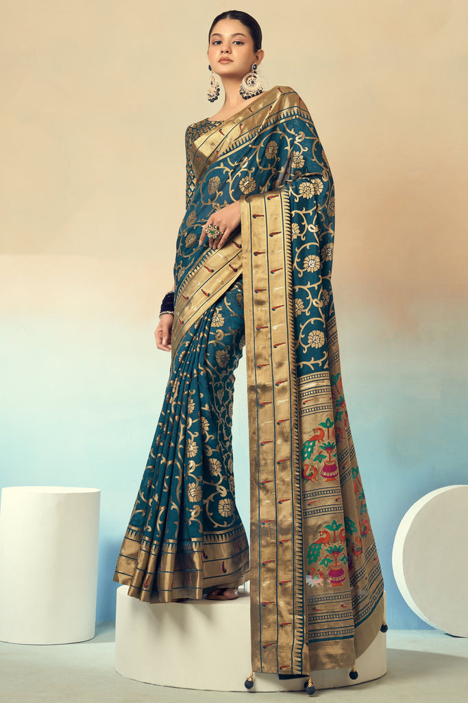 Pretty Teal Blue Zari Weaving Georgette Function Wear Saree With Blouse