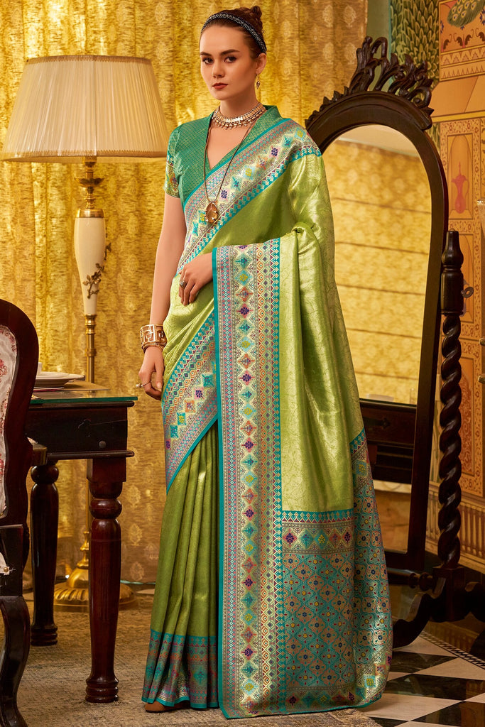 Ravishing Green Zari Weaving Tissue Silk Traditional Saree With Blouse