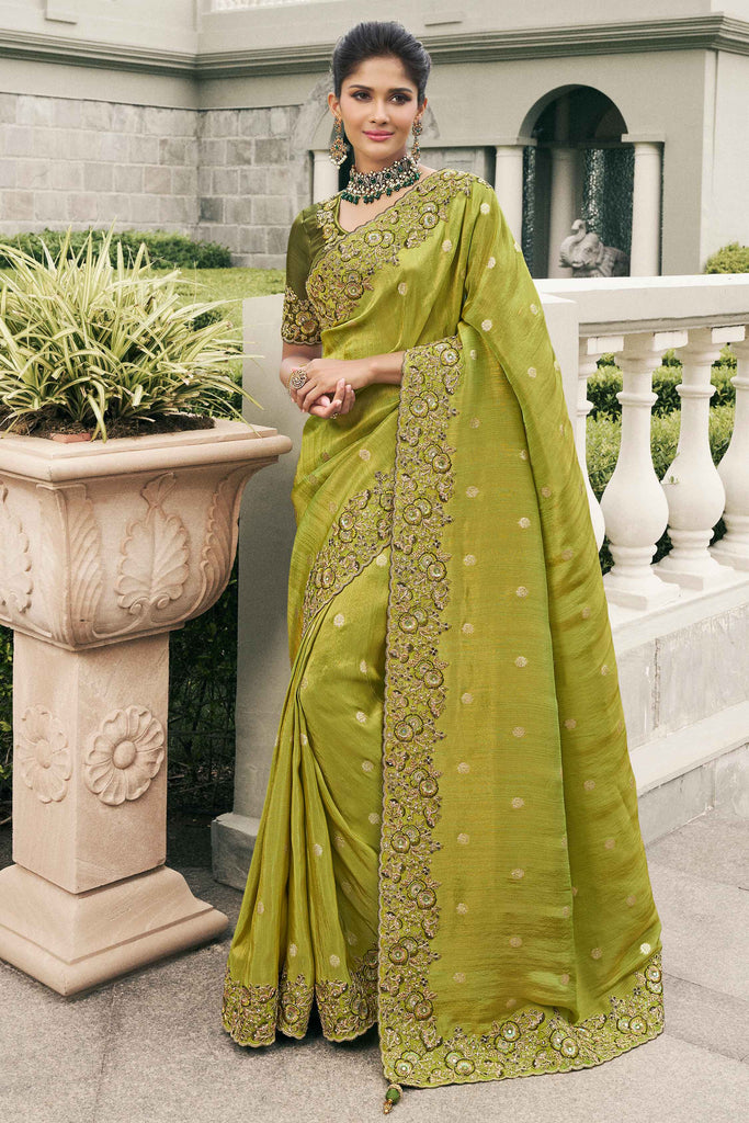 Spectacular Olive Green Embroidered Tissue Silk Event Wear Saree