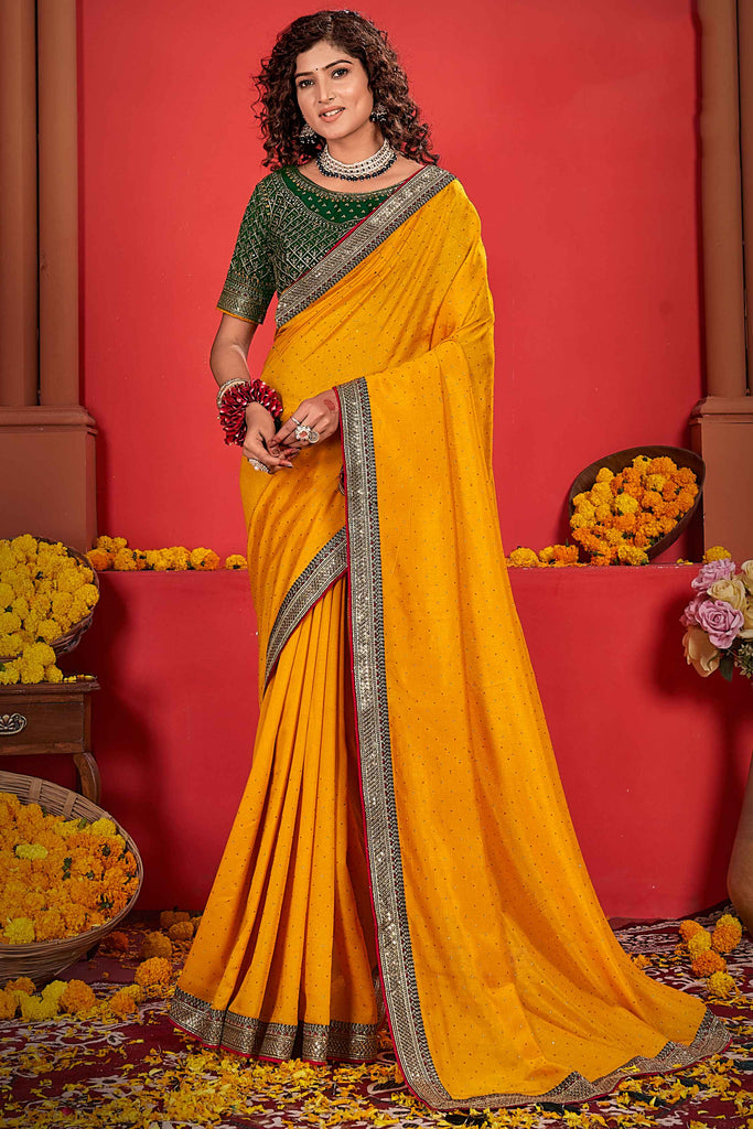 Enjoyable Mustard Heavy Border Work Vichitra Silk Haldi Wear Saree