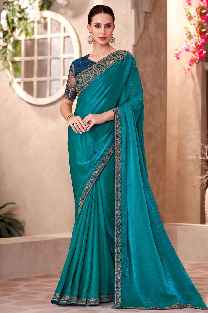 Bewitching Teal Blue Border Work Georgette Party Wear Saree