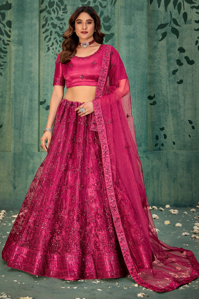 Fascinating Pink Sequins Net Engagement Wear Lehenga Choli