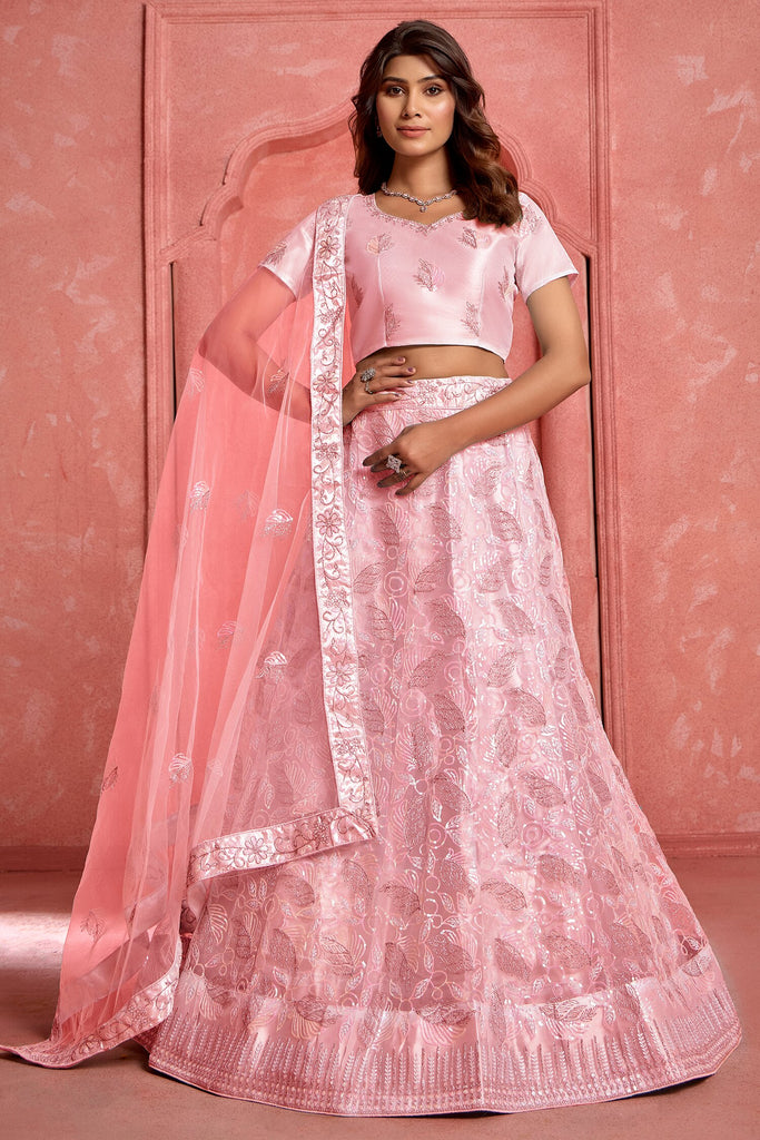 Fantastic Peach Sequins Net Engagement Wear Lehenga Choli