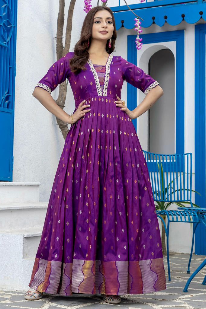 Bewitching Purple Zari Weaving Silk Festival Wear Gown