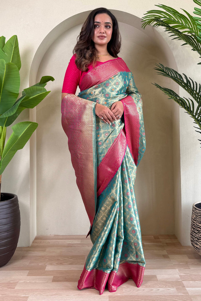 Pretty Teal Blue Zari Weaving Tissue Silk Traditional Saree With Blouse