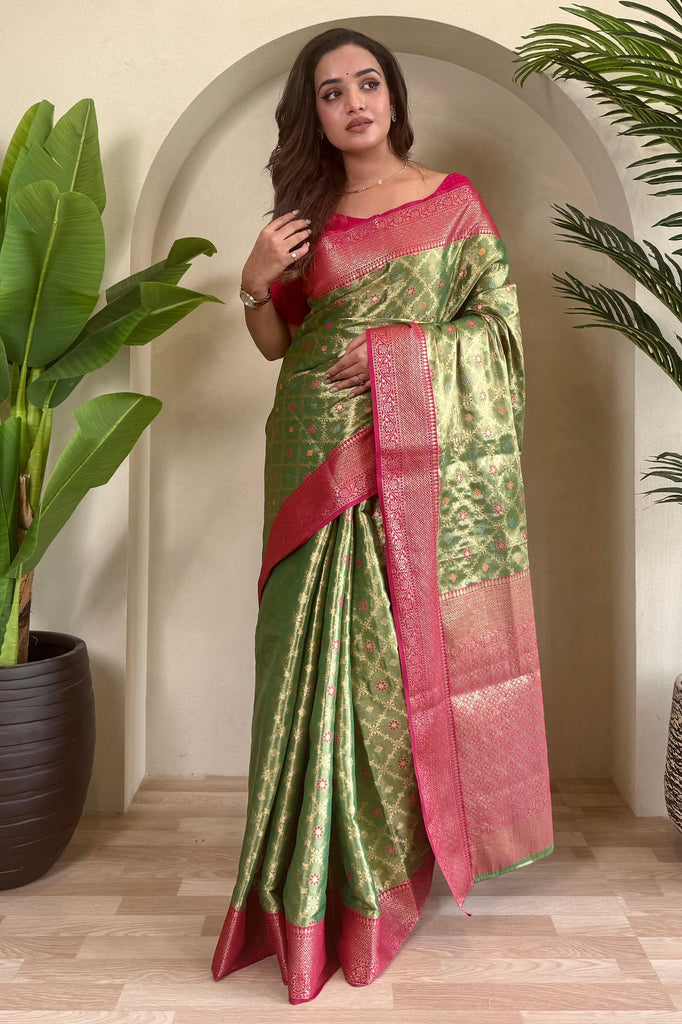 Delightful Green Zari Weaving Tissue Silk Mehendi Wear Saree