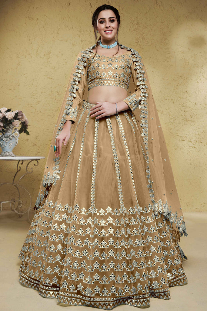 Stunning Beige Foil Work Net Function Wear Lehenga Choli With Dupatta