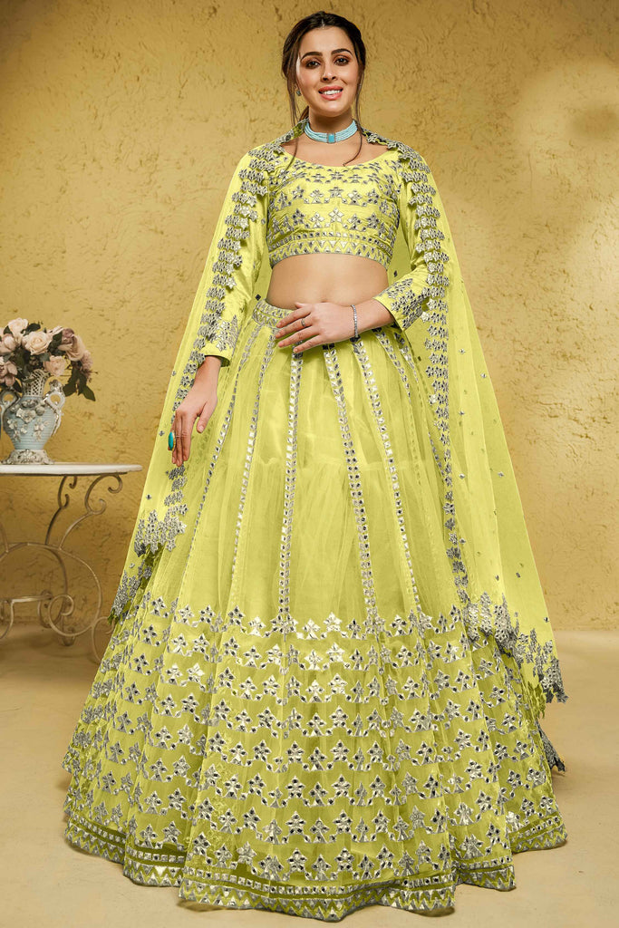 Delightful Lime Yellow Foil Work Net Wedding Wear Lehenga Choli