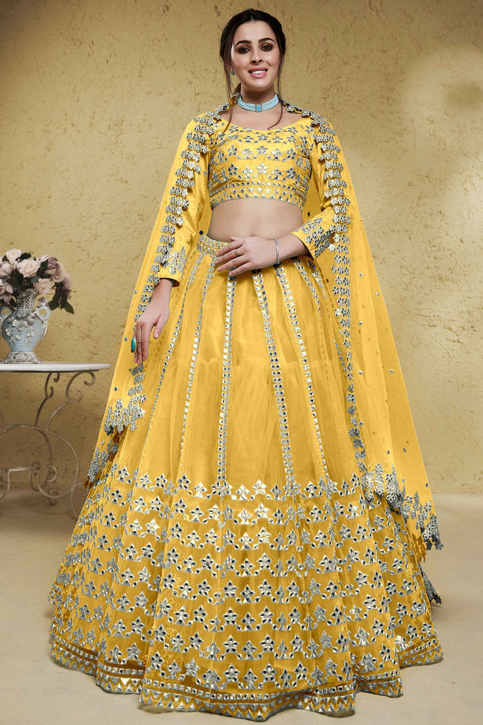 Adorable Yellow Foil Work Net Haldi Wear Lehenga Choli With Dupatta