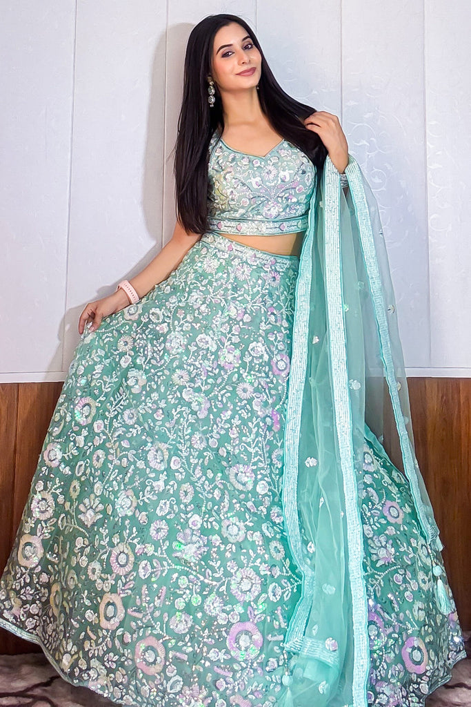 Glamorous Blue Sequins Net Engagement Wear Lehenga Choli With Dupatta