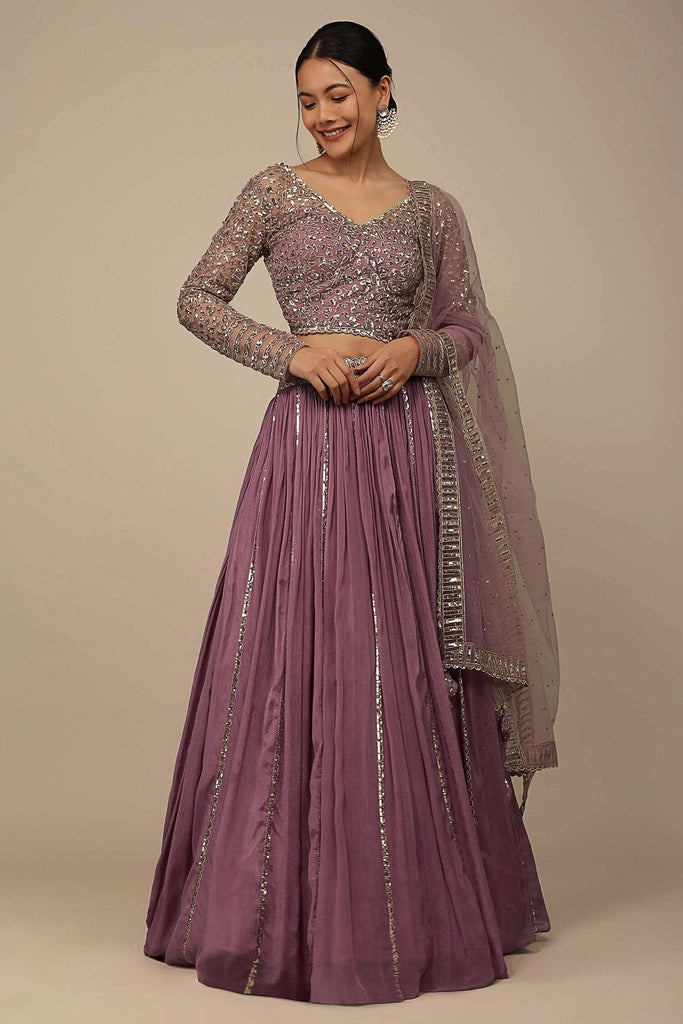 Outstanding Dark Mauve Sequins Georgette Party Wear Lehenga Choli