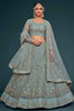 Surprising Aqua Blue Embroidered Soft Net Lehenga Choli With Dupatta