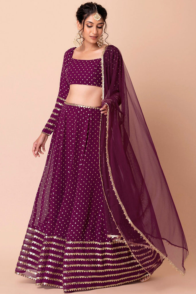 Impressive Purple Sequins Georgette Reception Wear Lehenga Choli
